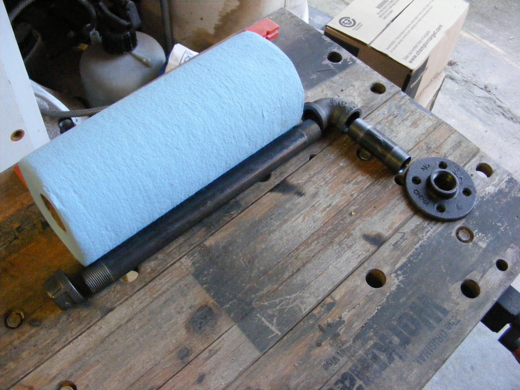 Industrial pipe towel holder